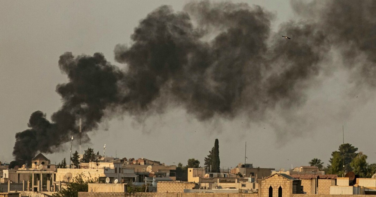 Smoke billows following Turkish bombardment on Syria's northeastern town of Ras al-Ain in the Hasakeh province along the Turkish border on October 9, 2019. - Turkey launched an assault on Kurdish forces in northern Syria with air strikes and explosions reported along the border. President Recep Tayyip Erdogan announced the start of the attack on Twitter, labelling it "Operation Peace Spring". (Photo by Delil SOULEIMAN / AFP)